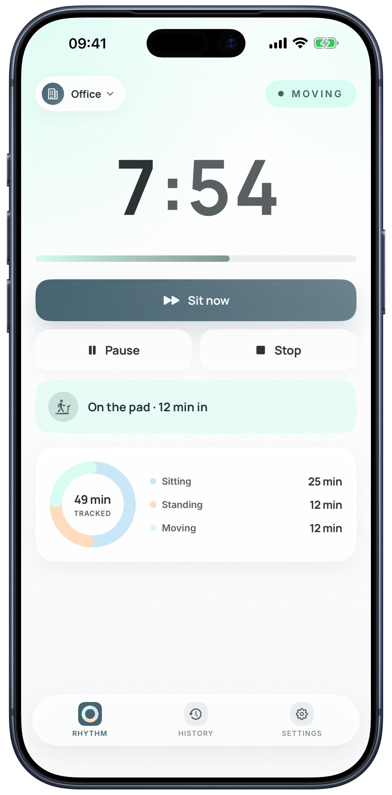 DeskRhythm's dashboard on iPhone during an active walking-pad session, showing the current phase timer, a “Sit now” prompt, and an “On the pad” indicator.